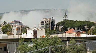 This photograph taken from the southern Lebanese area of Nabatieh shows smoke rising from the site of an Israeli strike that targeted the village of Habbouch on May 9, 2026. Lebanon said at least one person was killed in Israeli strikes on the country's south on May 9 despite a ceasefire with Hezbollah, after Israel's army issued an evacuation warning to several villages. (Photo by Abbas FAKIH / AFP)