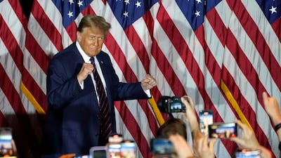 Republican presidential hopeful and former US president Donald Trump gestures during an Election Night Party in Nashua, New Hampshire. AFP