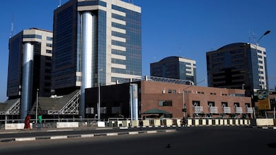 The Nigeria National Petroleum Corporation (NNPC) headquarters in Abuja, Nigeria. Despite rising prices, the state oil firm is still losing cash. Afolabi Sotunde/Reuters