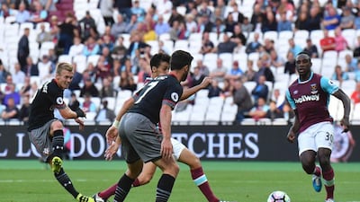 Southampton’s James Ward-Prowse, left, scores their third goal. Ben Stansall / AFP