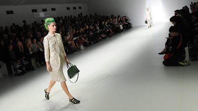 epa03871028 A model presents a creation by Irish designer Simone Rocha at the London Fashion Week, in London, Britain, 17 September 2013. The Spring/Summer 2014 collections are presented from 13 to 17 September. EPA/ANDY RAIN