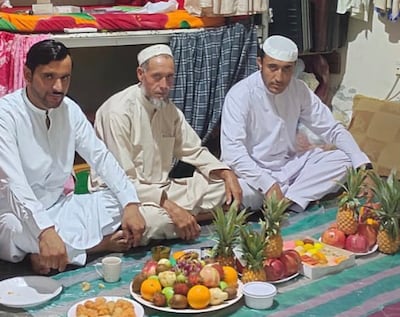 Ismail Khan (centre) with relatives in Abu Dhabi. Photo: Ismail Khan family