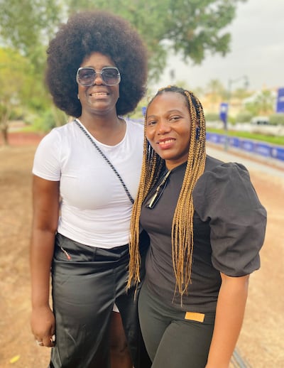 Dubai resident Lois Miberon Obajulu, right, with her sister Yemi Keri at the DP World Tour Championship. Photo: Paul Radley / The National