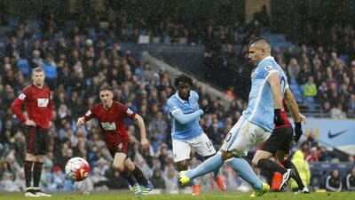Sergio Aguero scores the first goal for Manchester City from the penalty spot. Action Images via Reuters / Carl Recine