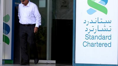 Standard Chartered has been closing thousands of SME accounts in the UAE following pressure from US regulatory authorities and stiffening competition with local banks. Satish Kumar / The National
