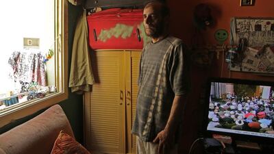 Amal Nail’s husband, Reda Ziki Hussein, lost his job and her bad arthritis has meant that the family are having to survive on very little money, with no hope of paying for her treatment unless they get help. Jeffrey E Biteng / The National