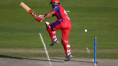 Virender Sehwag of Gemini Arabians plays a shot against Sagittarius Strikers on Friday during the Masters Champions League. Francois Nel / Getty Images