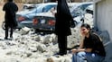 A woman weeps at the site of an Israeli air strike on the southern Lebanese village of Qennarit. AFP