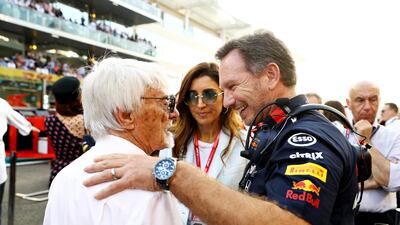 Red Bull Racing Team Principal Christian Horner talks with Bernie Ecclestone, Chairman Emeritus of the Formula One Group, on the grid. Getty Images
