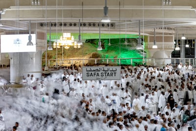 Pilgrims perform sa'i, the walk between the Marwa and Safa hills. AFP