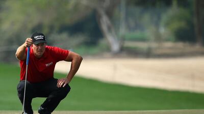 Henrik Stenson lines up a putt on Friday during the second round of the Omega Dubai Desert Classic. Marwan Naamani / AFP