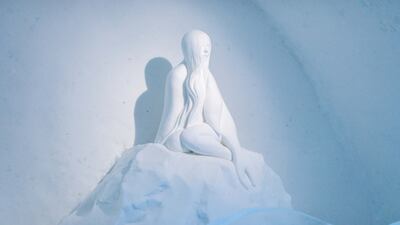 A folkloric seal maiden sits on an icy throne inside a suite by sisters and artists Emilie and Sara Steele. Photo: Asaf Kliger