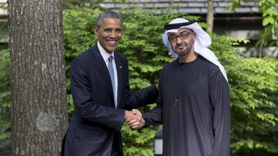 Sheikh Mohammed bin Zayed stands for a photo with US president Barack Obama after attending the US-GCC Summit at Camp David. Ryan Carter / Crown Prince Court - Abu Dhabi / May 14, 2015