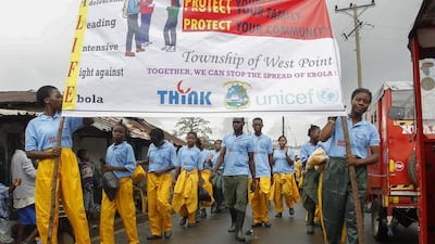 Liberian youths lead a sensitisation campaign to fight against the deadly Ebola virus in Monrovia, Liberia. Ahmed Jallanzo / EPA