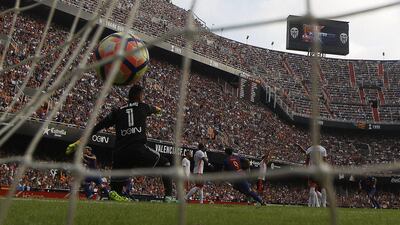 FC Barcelona’s Lionel Messi, left, celebrates after scoring in the team’s 3-2 win. Manu Fernandez / AP Photo