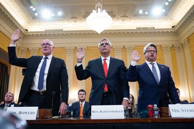 Arizona House Speaker Rusty Bowers (left) is sworn in to testify over the attack on the Capitol. AP