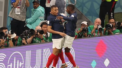 France's Kylian Mbappe celebrates scoring their third goal with Ousmane Dembele. Reuters