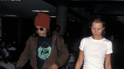Johnny Depp and Kate Moss arrive at Los Angeles Airport from New York City on July 22, 1996. Getty Images