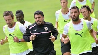 Gennaro Gattuso, centre, is in his second coaching job in less than a year. Tullio Puglia / Getty Images