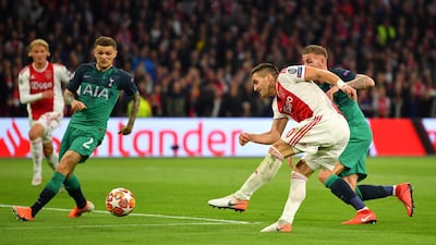 Ajax's Dusan Tadic shoots at goal. Getty