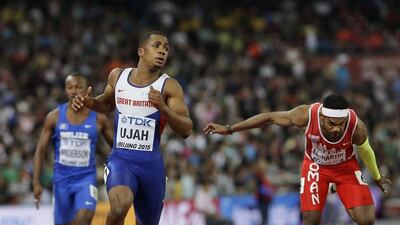 Britain’s Chijindu Ujah, centre, and Oman’s Barakat Mubarak Al Harthi, right, run in the men’s 100-metre heats on Saturday at the 2015 World Championships in China. David J Philip / AP