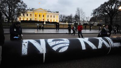 Environmental activists protest against the pipeline in front of the White House in Washington. AFP