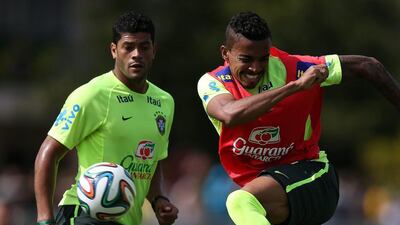 Brazil's Luiz Gustavo, right, and Hulk during a training session at Granja Comary in Teresopolis, Brazil, on July 7, 2014. Marcelo Sayao / EPA