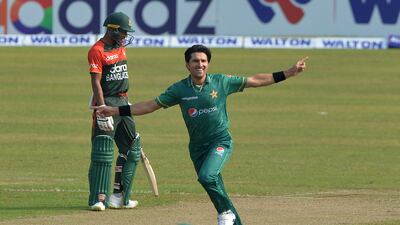 Pakistan's Mohammed Wasim celebrates after taking the wicket of Bangladesh's Mohammed Naim. AFP