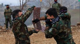 Iranian Kurdish fighters from the Kurdistan Freedom Party during training at a base on the outskirts of Erbil, Iraq. Reuters