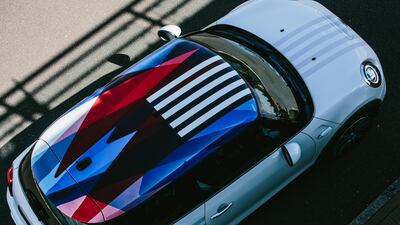 The one-off Mini is designed to incorporate the colours of the national flags of the UK and the US. Mini