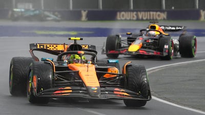 McLaren driver Lando Norris of Britain leads Red Bull driver Max Verstappen of the Netherlands. AP