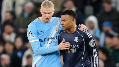 Erling Haaland and Kylian Mbappe embrace after Man City's defeat to Real Madrid in the last 16 of the 2025/26 competition. Getty Images