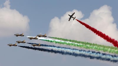 The UAE Air Force’s Al Fursan team during their aerial routine at the Dubai Airshow. Pawan Singh / The National
