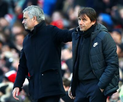 Jose Mourinho, left, and Antonio Conte were engaged in a war of words recently. Clive Brunskill / Getty Images