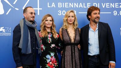 Director Darren Aronofsky (L) poses with actors Javier Bardem (R), Jennifer Lawrence (2nd R) and Michelle Pfeiffer during a photocall for the movie mother! Reuters