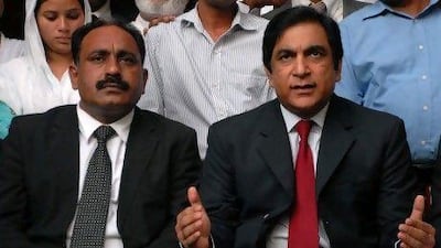 Paul Bhatti, right, the minister for national harmony, said that the Pakistani government would "talk to authorities" to ensure that Rimsha Masih will be protected. Mr Bhatti addressed the media with one of Rimsha's lawyers, Tahir Naveed Chaudhry, right, after the girl was granted bail after being arrested for alleged blashphemy. W Khan / EPA