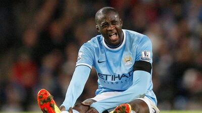 A disgruntled Yaya Toure cannot complain of workload because he was given an extended break after the World Cup. Jon Super / AP Photo
