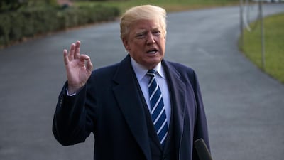 Donald Trump delivers remarks as he walks to board Marine One on the South Lawn of the White House on the guilty plea by former National Security Advisor Michael Flynn. EPA/Shawn Thew