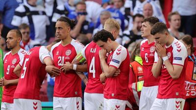 Denmark players react as Christian Eriksen receives medical attention, Reuters