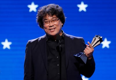 Director Bong Joon-ho accepts the Best Director award for 'Parasite'. Reuters