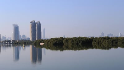 Abu Dhabi skyline, shot from the Eastern Mangroves showing Reem Island. Ravindranath K / The National