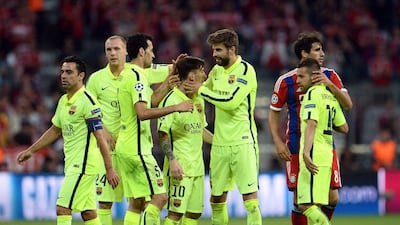 Under Luis Enrique, Barcelona have a more direct style, but they have not given up on possession play. Andreas Gebert / EPA