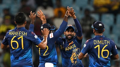 Sri Lanka's players celebrate after the run out of Australia's Mitchell Marsh. AFP