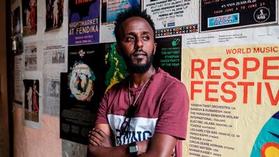 Eritrean painter Noah Mulubrhan, 35, at a local gallery in Addis Ababa. AFP