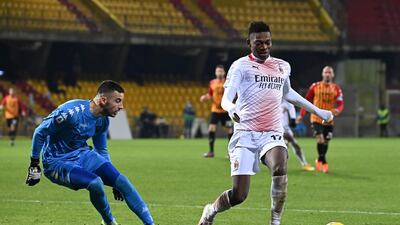 AC Milan's Rafael Leao attempts to go past Benevento goalkeeper Lorenzo Montipo. AFP