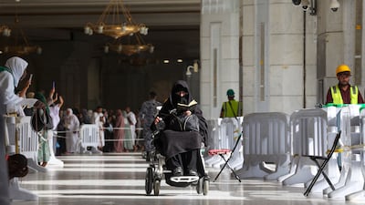 A worshipper in a wheelchair. Hajj takes place during Dhu Al Hijja, the last month of the Islamic calendar. AFP
