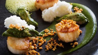 Seared Scallops with Duck Green Curry at Esquina in Singapore. Courtesy Esquina