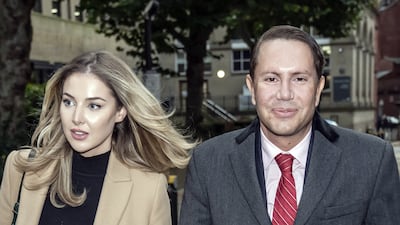 James Stunt leaves Cloth Hall Court in Leeds with his current partner Helena Robinson. PA