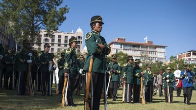 Member of the South African National Defense Force wait to participate in a parade as thousands of people celebrate 20 years of democracy during a Freedom Day event held at the Union Buildings in Pretoria, South Africa. Ihsaan Haffejee / EPA