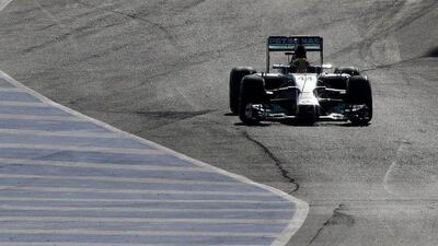 Lewis Hamilton tests Mercedes' new Formula One car for the 2014 season in Jerez, Spain on Wednesday. Roman Rios / EPA